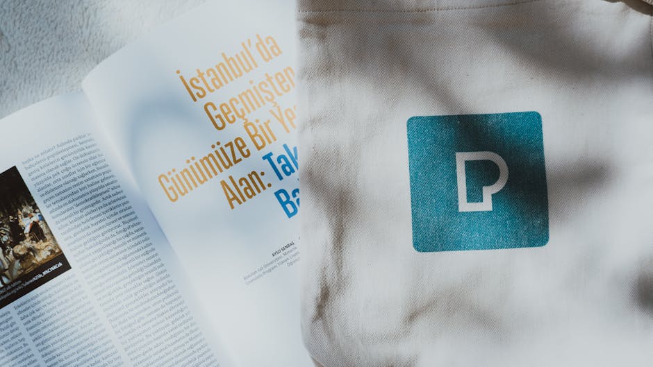 Open magazine showing Istanbul text alongside a tote bag with a blue logo.